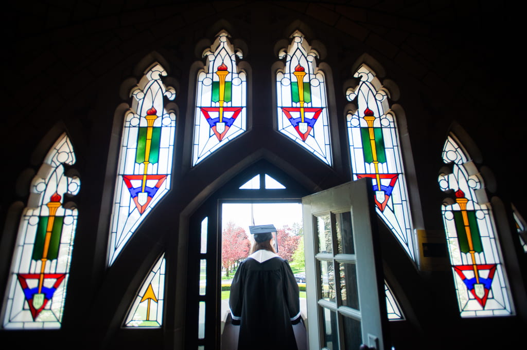 graduate standing on harkins balcony